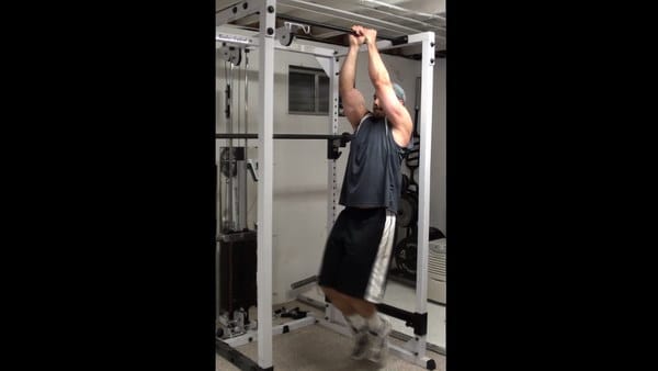 Perpendicular Bar Hanging Leg Raises for Targeted Oblique Training