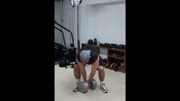 Resting Goblet Squats for Targeted Oblique and Leg Work