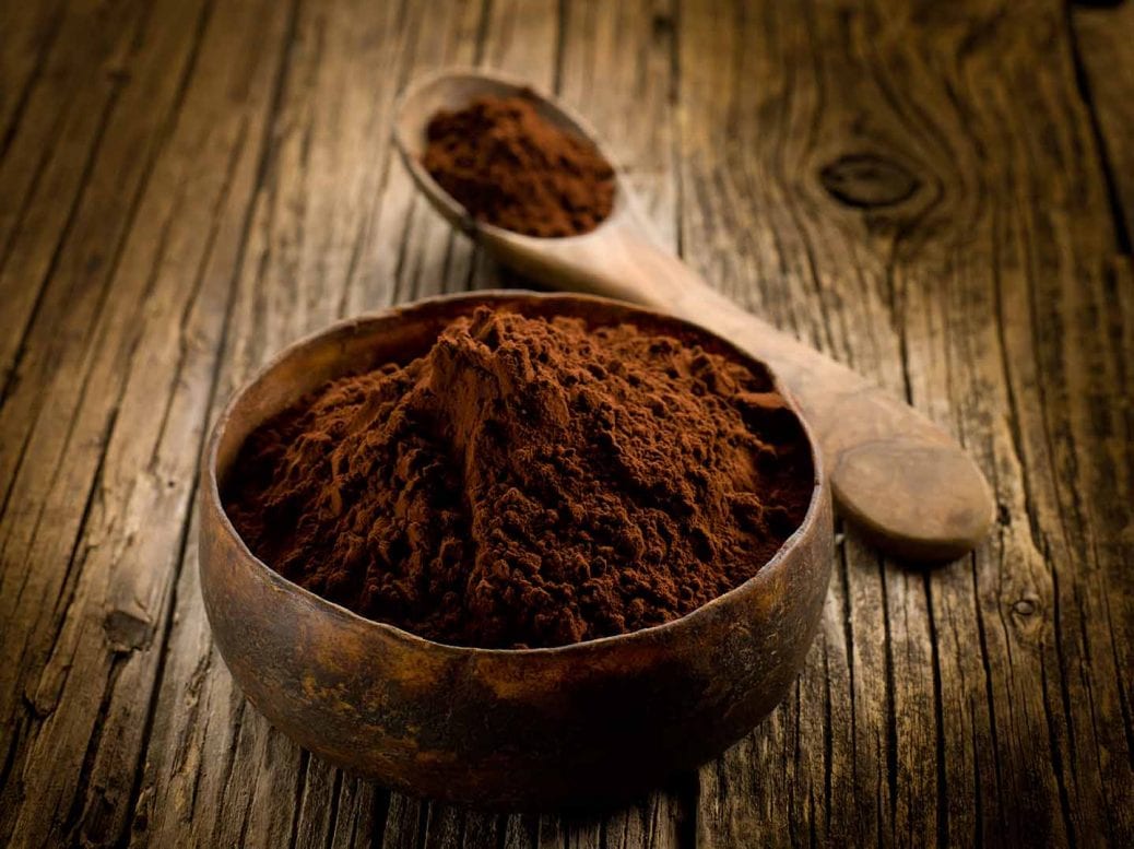 cacao powder on wood bowl