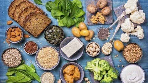 Vegan protein sources. Top view on a blue wooden background