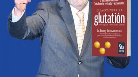 Picture of doctor Gutman holding his book