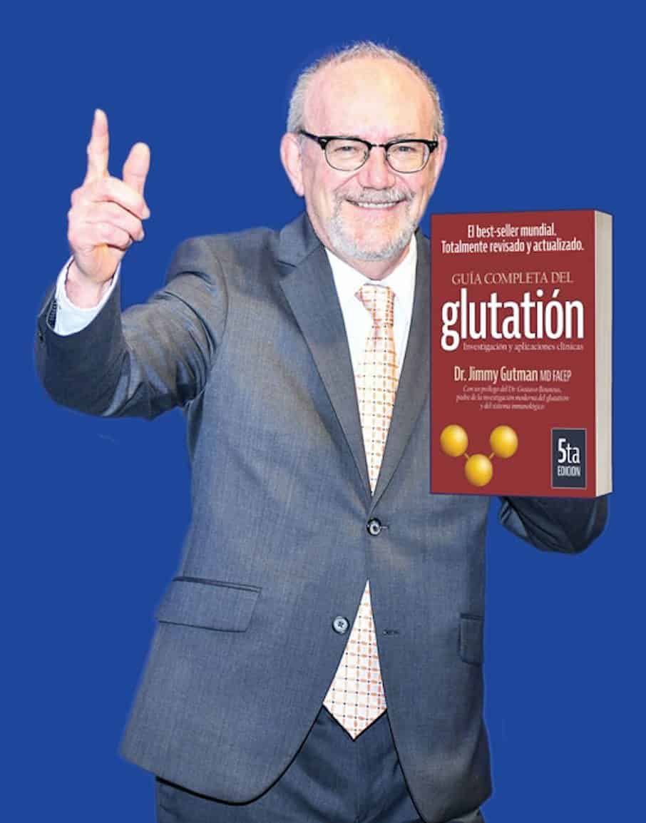 Picture of doctor Gutman holding his book